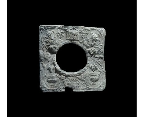  1st-2nd century AD. A flat-section square lead frame with central circular hole and rim; raised design to one face of vases,