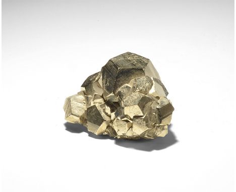  . A fine group of pyrite crystals with superb pyritohedral crystallisation and bright faces; with old Gregory, Bottley and L