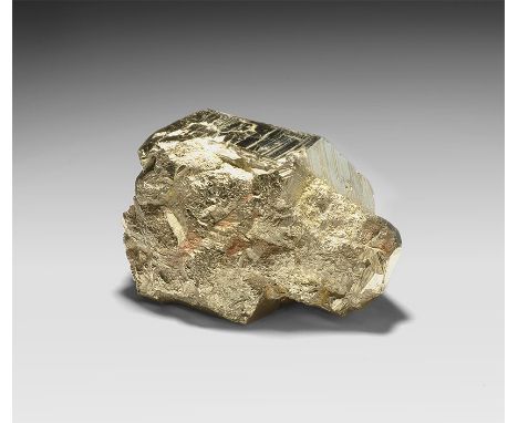  . A large pyritohedral pyrite crystal with accompanying smaller pyritohedral crystal, from Ancash Province, Peru; from the G