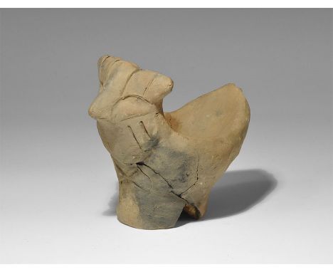  Neolithic, 6th-5th millennium BC. A terracotta vessel comprising a scaphoid body with head and columnar base; the body and b
