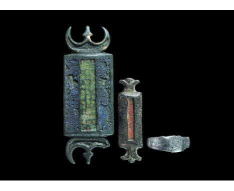  2nd-4th century AD. A mixed group of military dress items comprising: a silver ring with D-section hoop, flat plaque with 'V