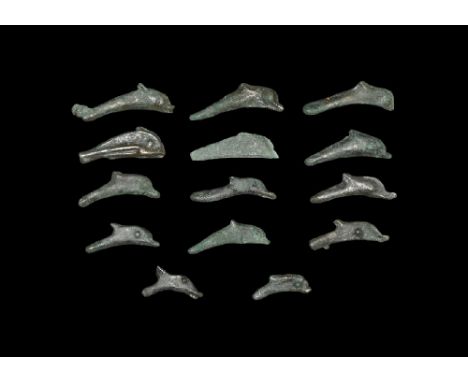  6th century BC. Group comprising: cast 'coins' or currency pieces in the form of a bifacial dolphin. Sear 1684. 24.84 grams 