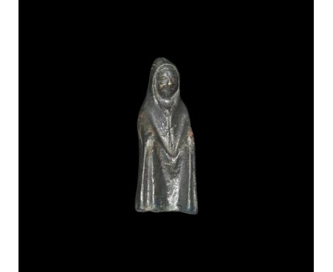  1st-3rd century AD. A bronze statuette of Telesphorus dressed in a long hooded cape covering everything apart face, hands sl