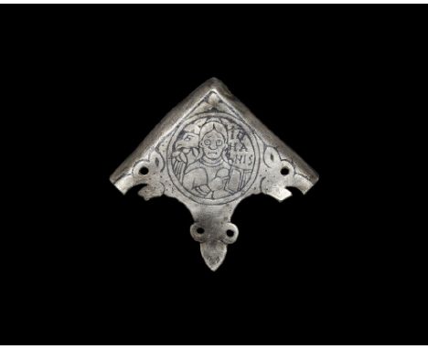  9th century AD. A rectangular book or casket mount with chamfered outer edges, scooped inner edges and trefoil between; inci