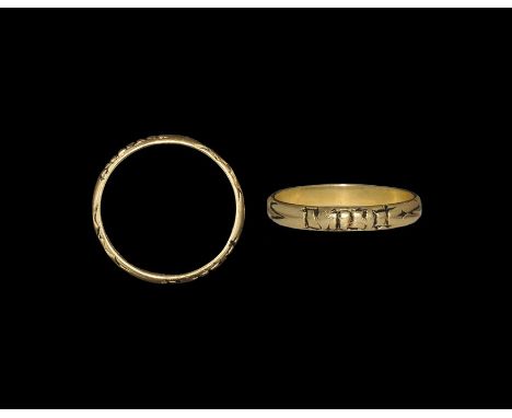  Late 18th-19th century AD. A D-section gold hoop with reserved cross clechée motifs on black enamel, dense blackletter scrip