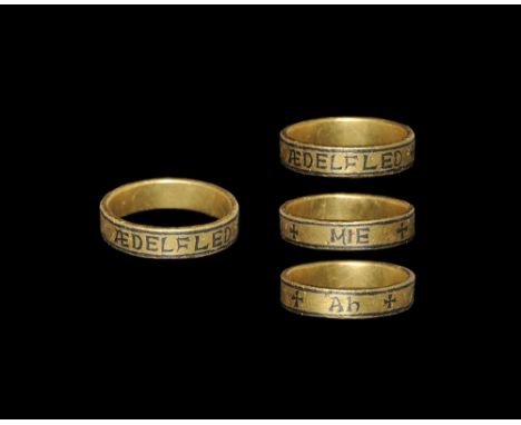  10th century AD. A substantial flat-section gold hoop with niello-filled borders and owner's inscription in Insular script '