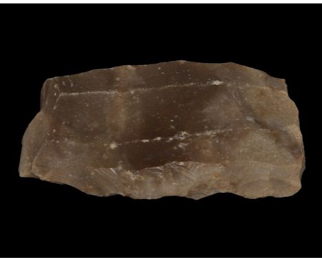  Neolithic, 5th-3rd millennium BC. A flint core carefully knapped to form a typical prepared livre-de-beurre showing the scar