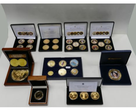 Nine cased sets of coins - two sets 100th anniversary of House of Windsor 5 coin sets, QEII TDC £5 coins x 4, platinum weddin