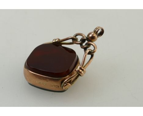 9ct rose gold swivel fob set bloodstone & cornelian. Hallmarks for Chester 1906, makers mark W&R. Measures 31mm x 22mm width 