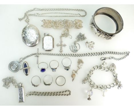  A collection of ladies silver jewellery including ornate bangle, pendant and chains, pendants, charm bracelets, various ring