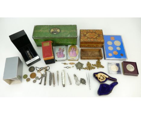 A collection items including coins, military cap badges, penknives, Jacob &amp; Co cracker tin, Measham pipe etc