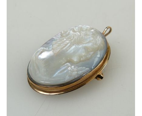 9ct gold mounted mother of pearl unusual Italian cameo brooch/pendant. Height 41mm max. 8.3g