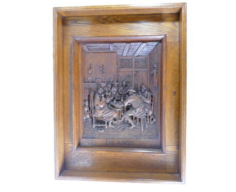 Deep relief oak carved panel signed J M Kirkbride of Windermere - 'The Rubber' 76cm x 57cm