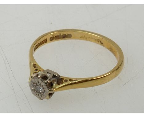 18ct yellow gold diamond single stone ring with white gold setting.  Weight 2.1g. Size M.