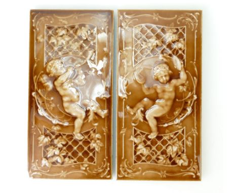 Pair 19th Century Minton Hollins rectangular tile panels decorated with cupids playing musical instruments, 30 x 15cm (2) (li