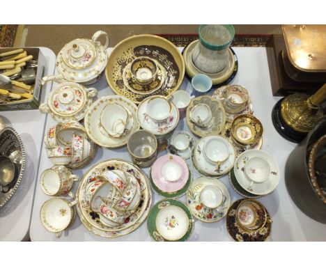 A collection of ceramic teacups and saucers, mainly chipped and with hairline cracks, a collection of 19th century English te