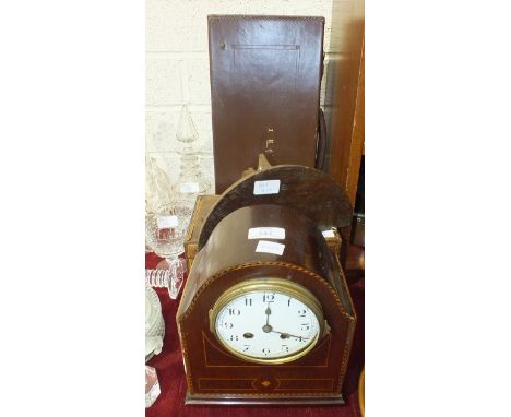 An inlaid mahogany-cased striking mantel clock, 24cm high, (a/f), a leather Masonic case and other items.