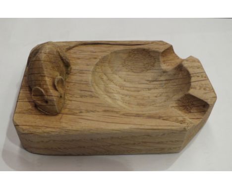 A Robert "Mouseman" Thompson oak ashtray with carved mouse signature, 10 x 7.5cm.