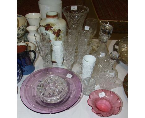 A collection of various ceramic and other table lamps with shades and a collection of various glassware, including drinking g