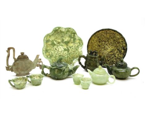 A quantity of jade and jadeite miniatures , to include teapots and cups, etc (Qty.)