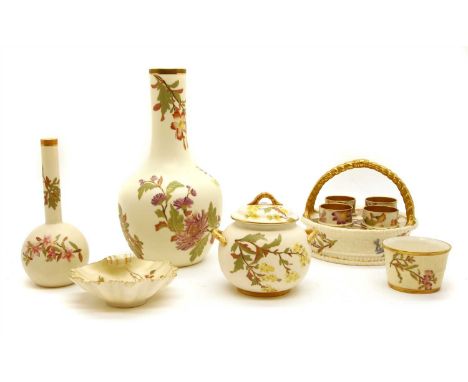 A collection of Royal Worcester ivory and gilt porcelain items , with floral decoration, heightened in gilt, comprising a mal