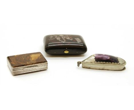 A tortoiseshell and pique work purse, 19th century, inscribed `Leonie', with floral decoration, 7cm long, a white metal and a
