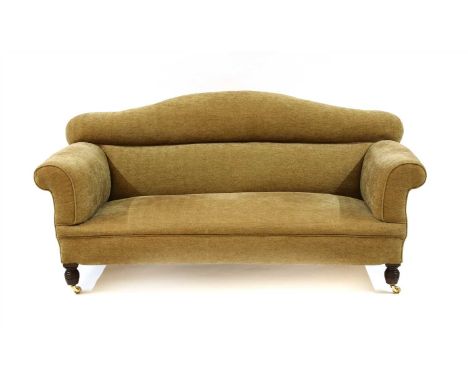 A Victorian two seater camel back sofa , with fawn upholstery