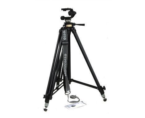 A Manfrotto camera tripod , model 028B, with carrying strap
