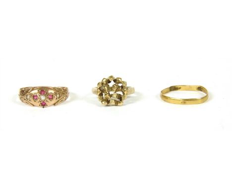 A 9ct gold ring, the head designed as an openwork cluster of textured and plain polished cubes, to a plain polished shank, Bi