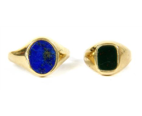 A 9ct gold cushion shaped bloodstone signet ring, Birmingham 1976, size I, and a 9ct gold oval lapis lazuli signet ring, Lond