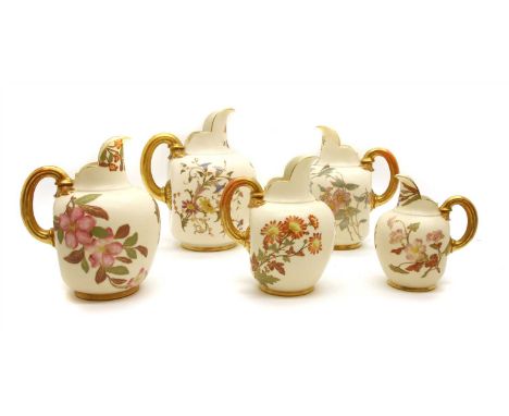 A group of five Royal Worcester porcelain flat back jugs , with floral decoration and gilt highlights, in graduated sizes, ta