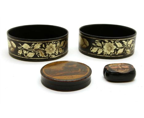 Four lacquer items, comprising: a pair of coasters, decorated with shelles and flowers,13.5 cm diam, a circular lidded box, p