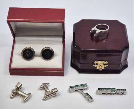 A silver ring, Sheffield 1945, size UK O 1/2, together with two pairs of railway locomotive silver cufflinks and a pair of si