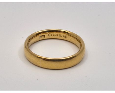 A 22ct. gold band, Birmingham 1923, size UK M. (5.4g)&nbsp;