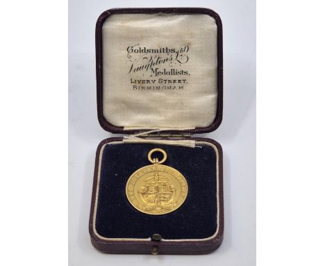 Football Interest: A 9ct. gold fob medal; The Football Association Amateur Cup Winners Medal, by Vaughton &amp; Sons, Birming