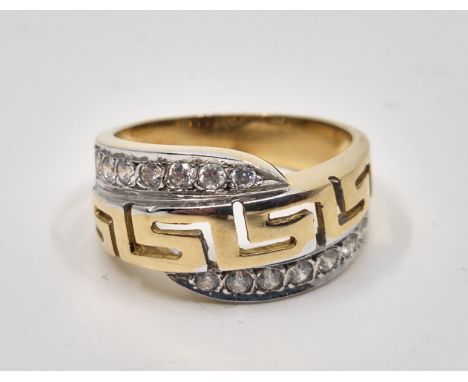 A 14ct gold and CZ ring, having pierced Greek key flanked by off-set rows of pave set CZ to top and bottom, size UK P 1/2. (g