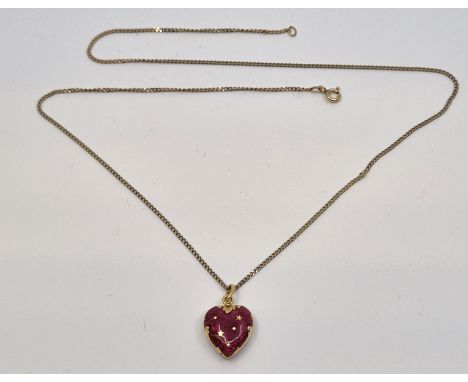 A Faberge 18ct. gold and red guilloche enamel heart pendant, stamped "Faberge" and no., height 29.5mm (gross weight 4.0g), su