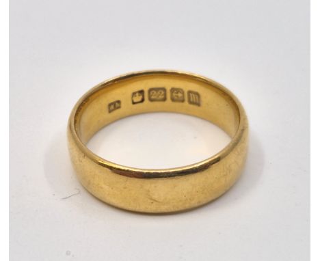 A 22ct. gold band, Birmingham 1911, size UK L 1/2. (6.6g)&nbsp;