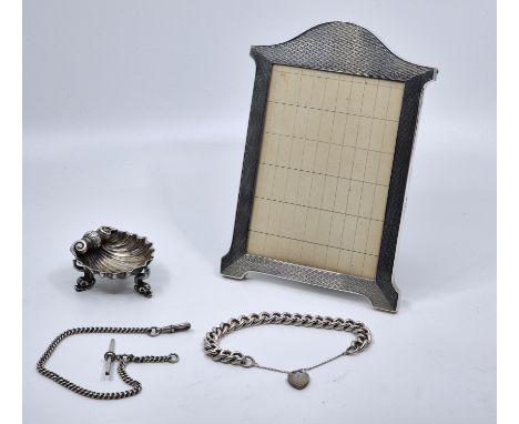 A silver engine turned easel back photograph frame, Birmingham 1926, makers mark rubbed, with oak easel back, height 18cm, to