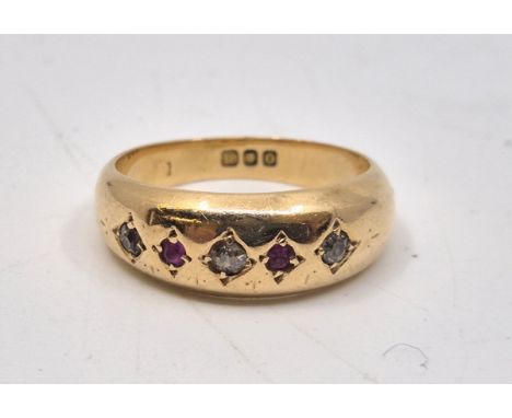 An 18ct. gold, ruby and diamond ring,&nbsp;London 1909, gypsy set three old-cut diamonds alternating two round cut rubies, si