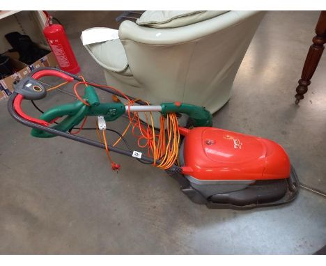 A Flymo Hover compact 330 lawn mower and a Black and Decker strimmer