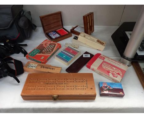 A good lot of games including cribbage, cards, dominoes, draughts and chess travelling set, poker dice etc.