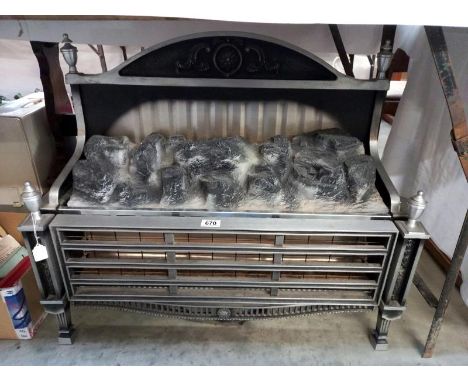 A large vintage coal effect electric fire.