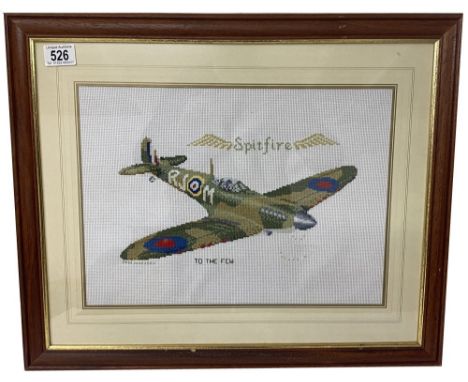 A framed tapestry of a Spitfire featuring the words Spitfire To The Few (Donated by Upcycled Innovations)Frame has some small