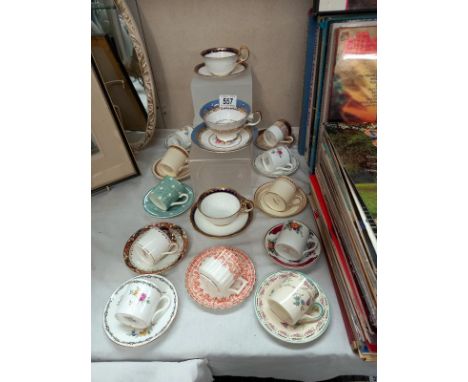 A good assortment of decorative cups and saucers, coffee cans and saucers including Aynsley, Shelley etc