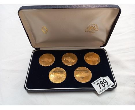 A cased vintage Renault launch date 1986 medallion set