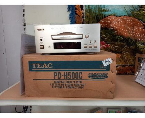 A boxed Teal PD-H500L compact disc player