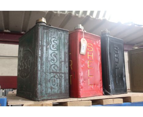 Two Shell and one Esso 2 gallon petrol cans