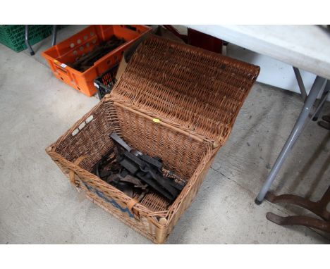 A F&amp;M wicker basket and contents of various traps