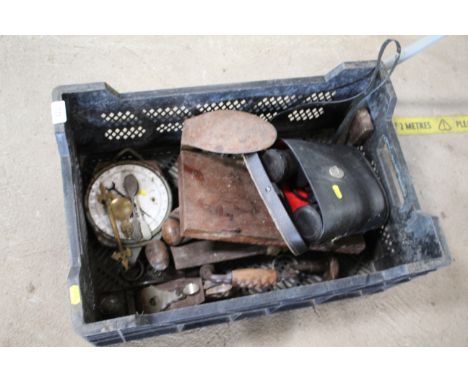 A box containing shoe last, binoculars, spring balance scales, spoke shaves etc.